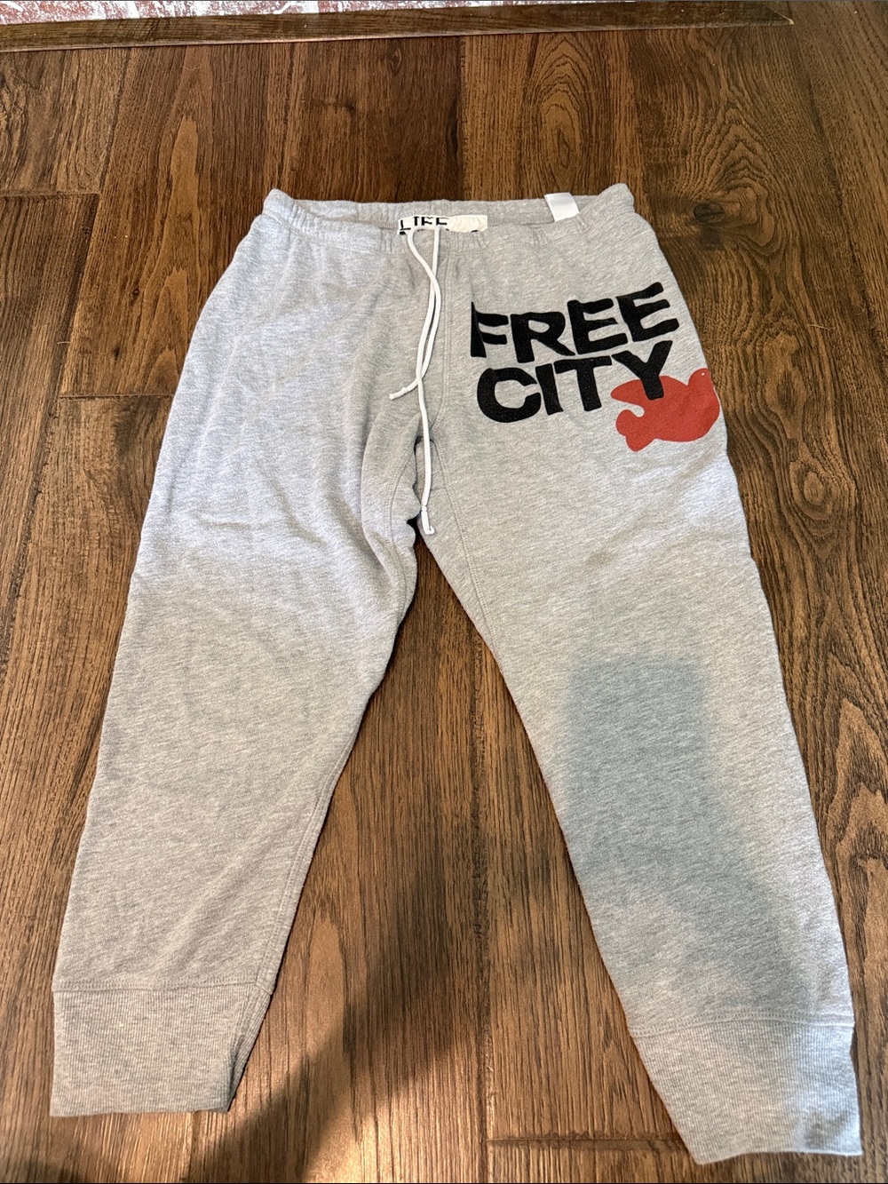 freecity Gray Sweatpants with Black Logo and Red Accent